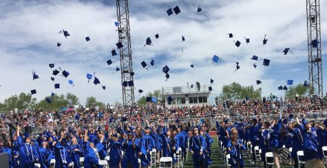 2016 graduates throw their caps in the air to celebrate this milestone