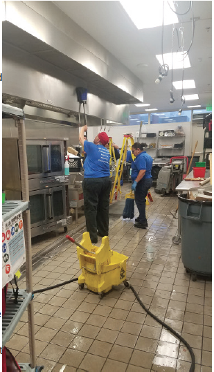 Kitchen manager Cheryl Hicks and the entire
cafeteria staff deep clean the kitchen. Photo
by Pirateer Staff