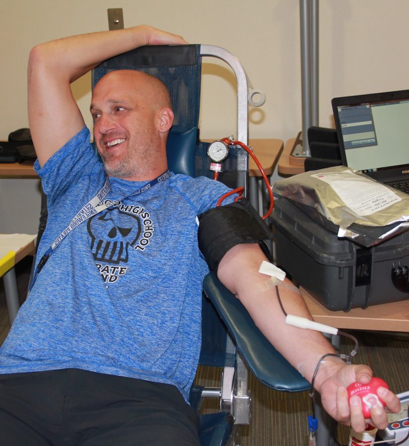 Teacher Scott Silva donated blood during a break between classes. 
