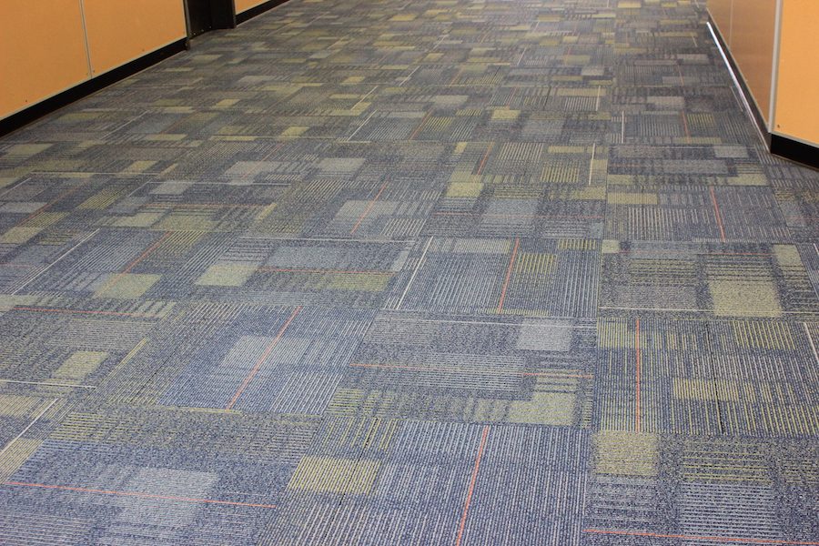 The carpet in the middle school hallway cuts down on sound. 