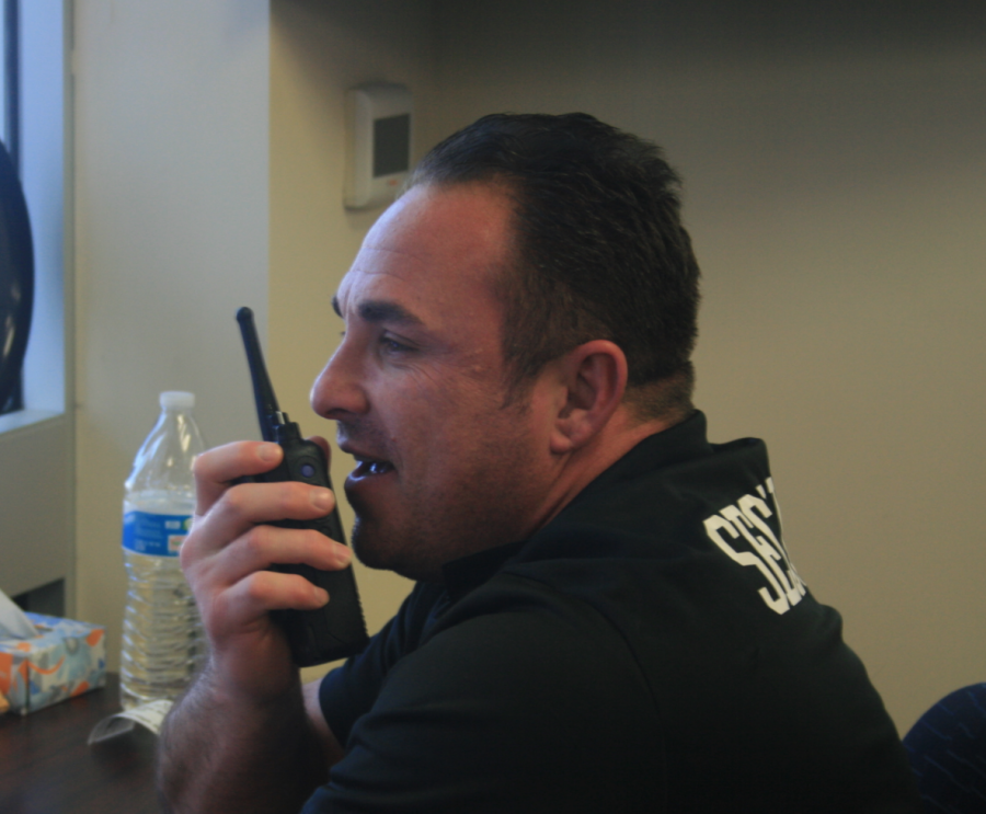 Security Steven Heit handles front desk duty just weeks ahead of spring break.