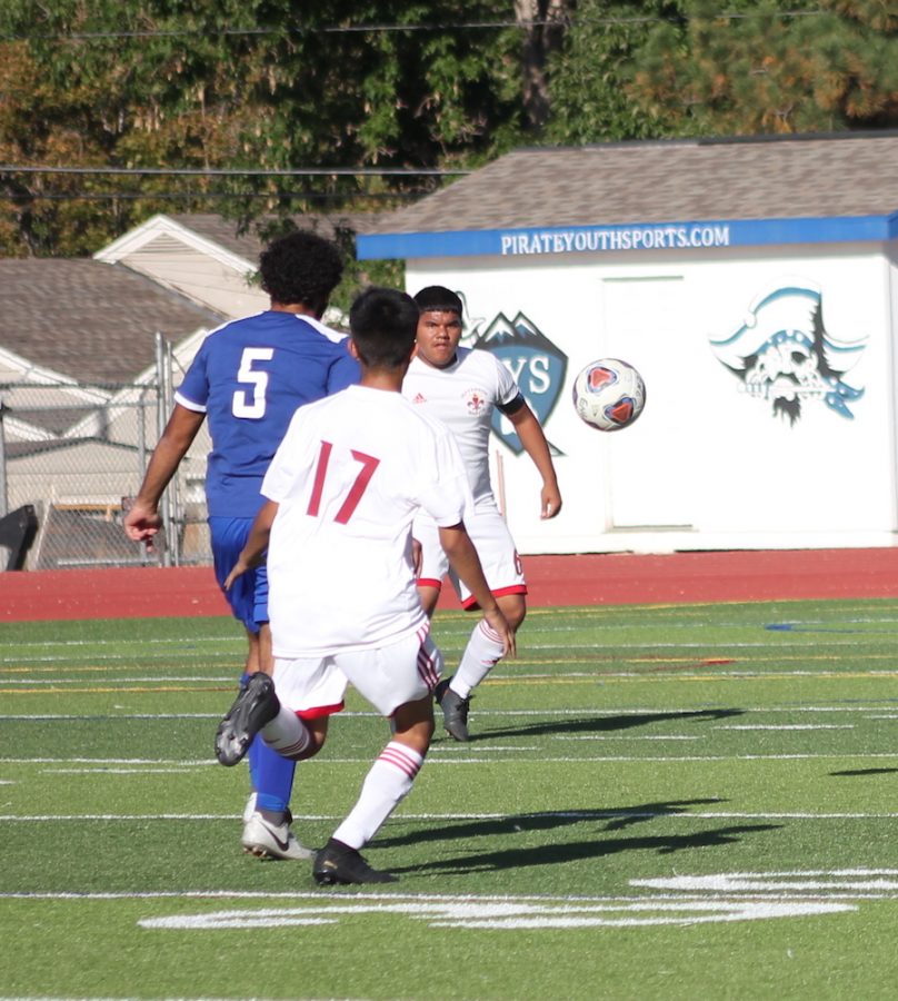Number 5, Kirollos Naseef,  drives to the goal. 