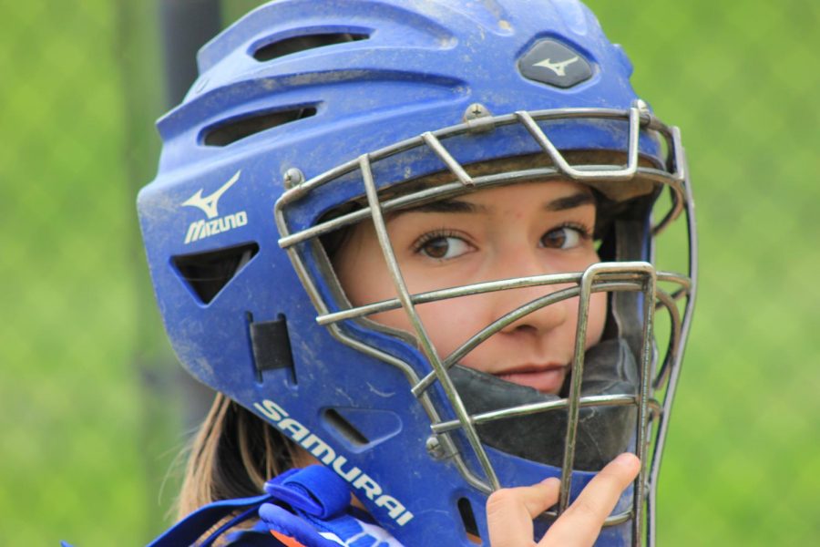 EHS softball catcher sites ready for the first pitch of a recent game. 