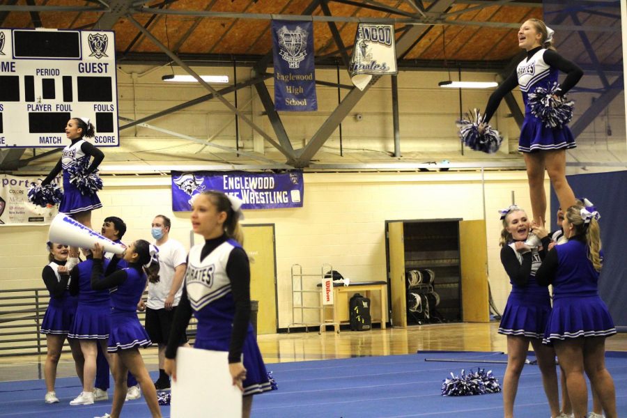 Cheer athletes work hard on the complex moves and lifts so they have clean lines and high energy. 