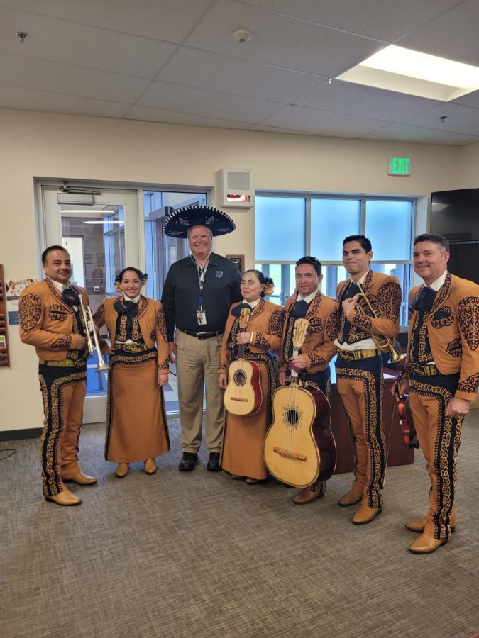 EHS principal Ryan West dons a sombrero after learning the senior class hired a mariachi band.  