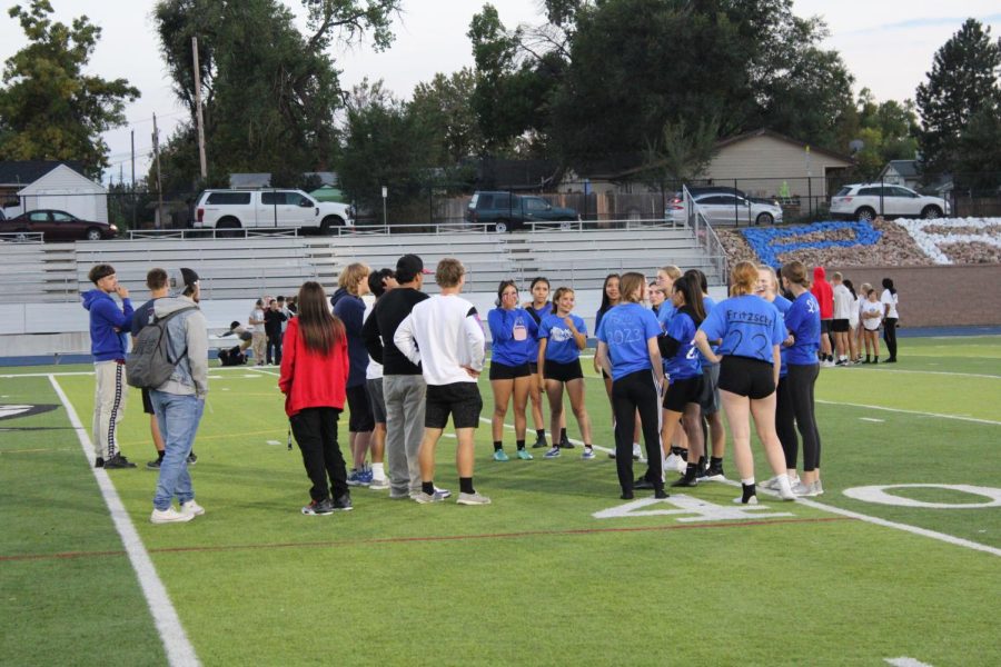 Upperclassmen get some last-minute coaching during the Powderpuff game. 