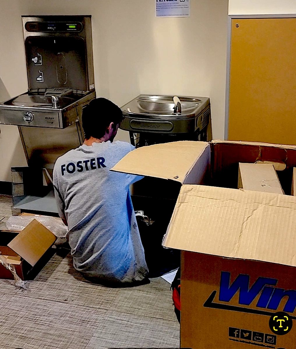 Two journeyman plumbers from Foster Plumbing spent hours installing the white canisters to the left side of the fountains near the high school gym, in the Commons, and in the ELA hallway. The workers said the installation process took roughly 30 minutes each. 
