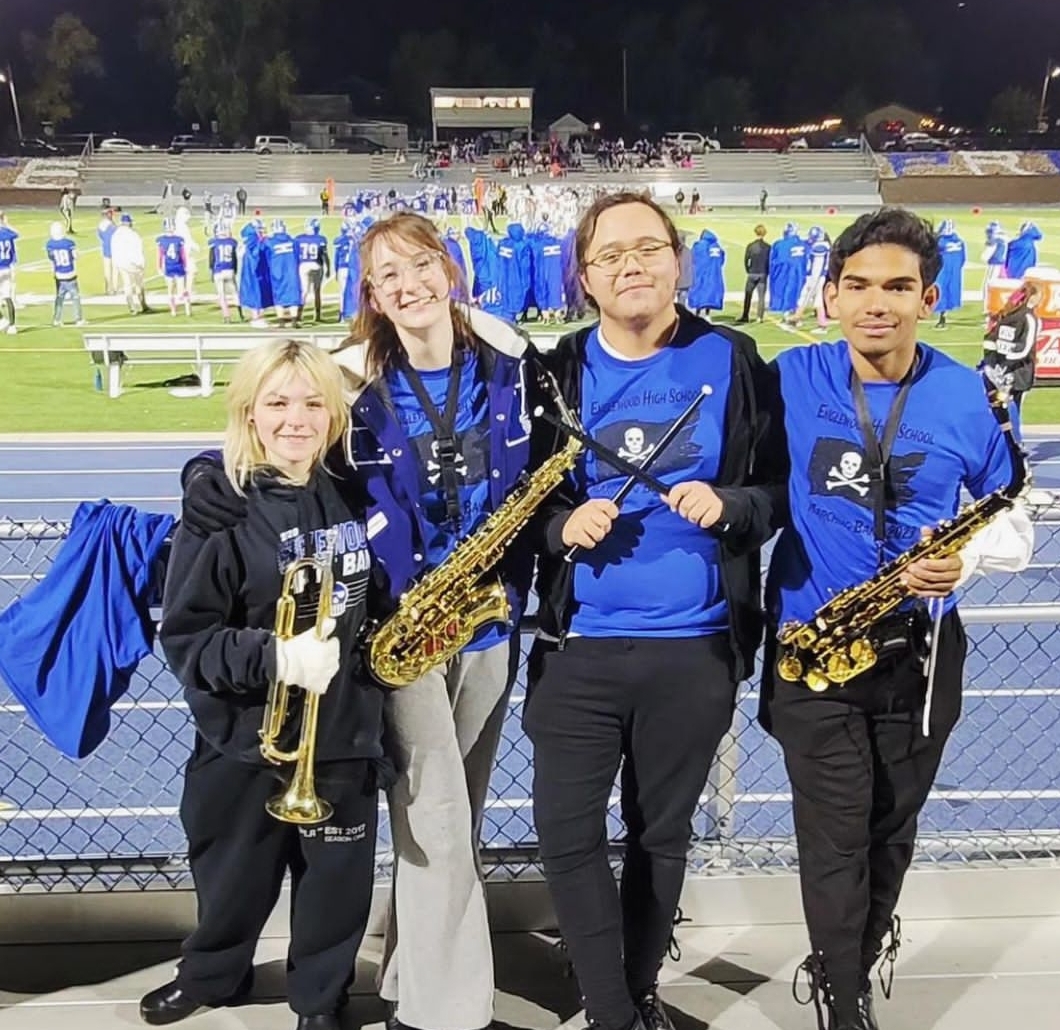Band seniors are honored at the last home high school football game. 
