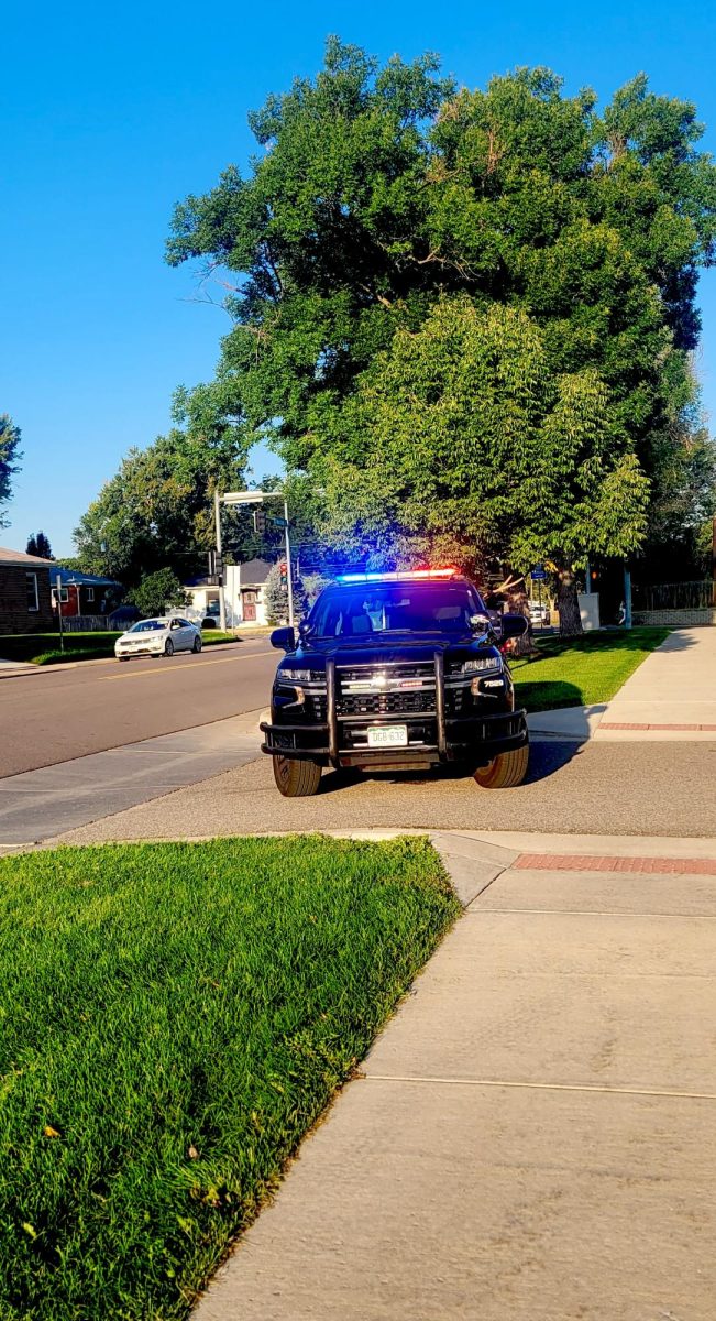 Englewood police officers and K9 units blocked off all driveways into the TEC campus Monday. 