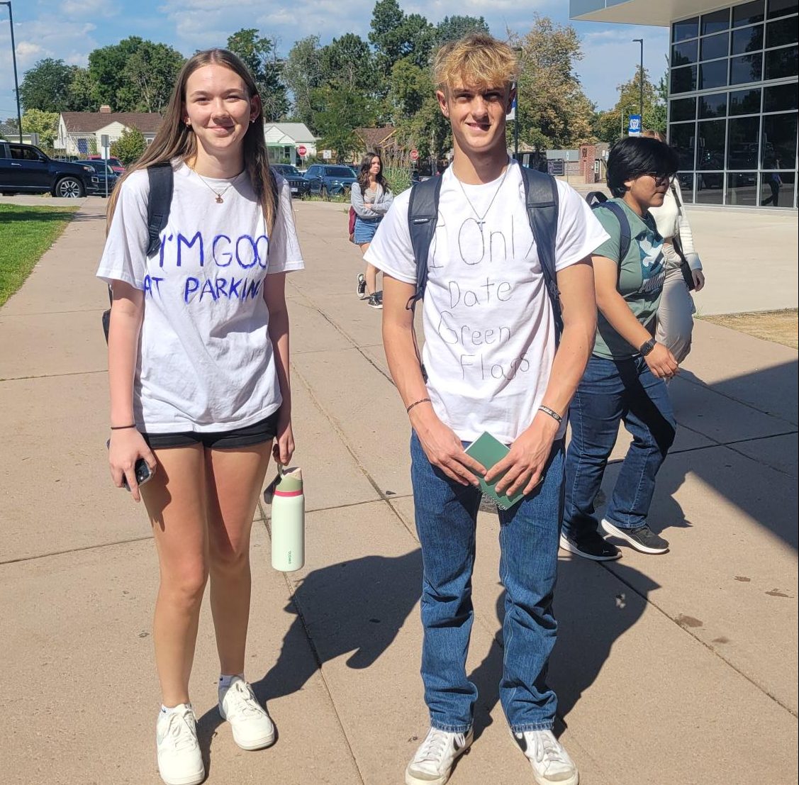 Dylan Noll and Alex Fox dress up for Homecoming in their best White Lie. 