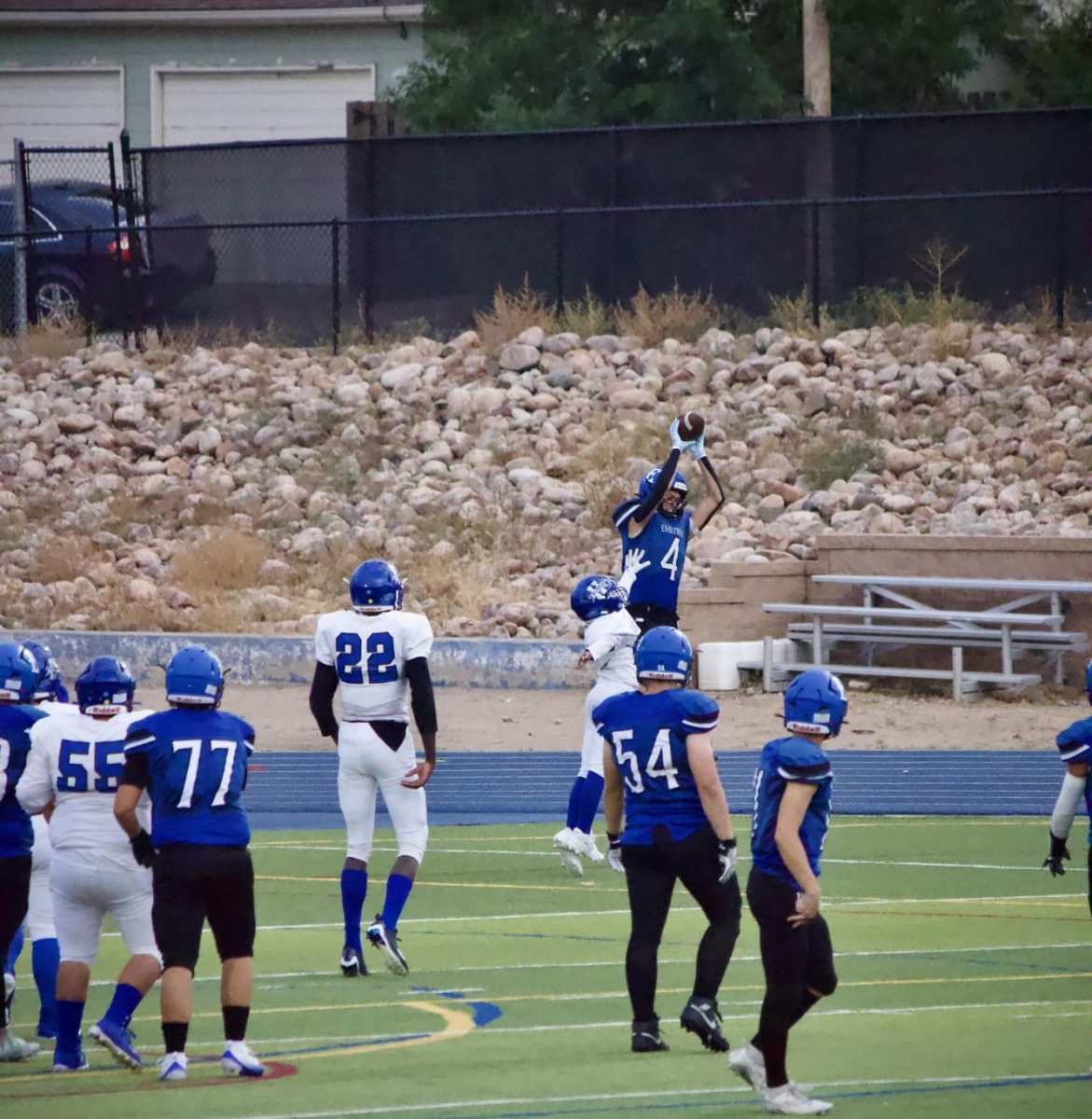 #4 Nathan Owens catches a TD, one of several resulting in a final score of 63-6. 