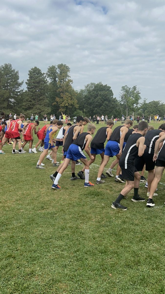 Cross country boys line up for the start of the Steve Lohman Invite at Village Greens Park in Greenwood Village. 