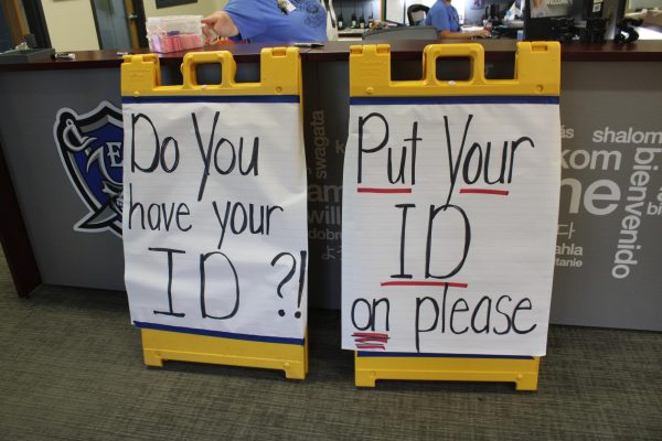 This board sits at the front of the school reminding students to put their ID on before entering school. 