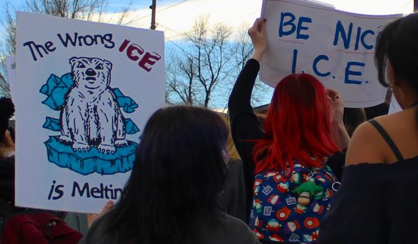 Englewood students walk out of class to support fellow students worried about their safety. 
